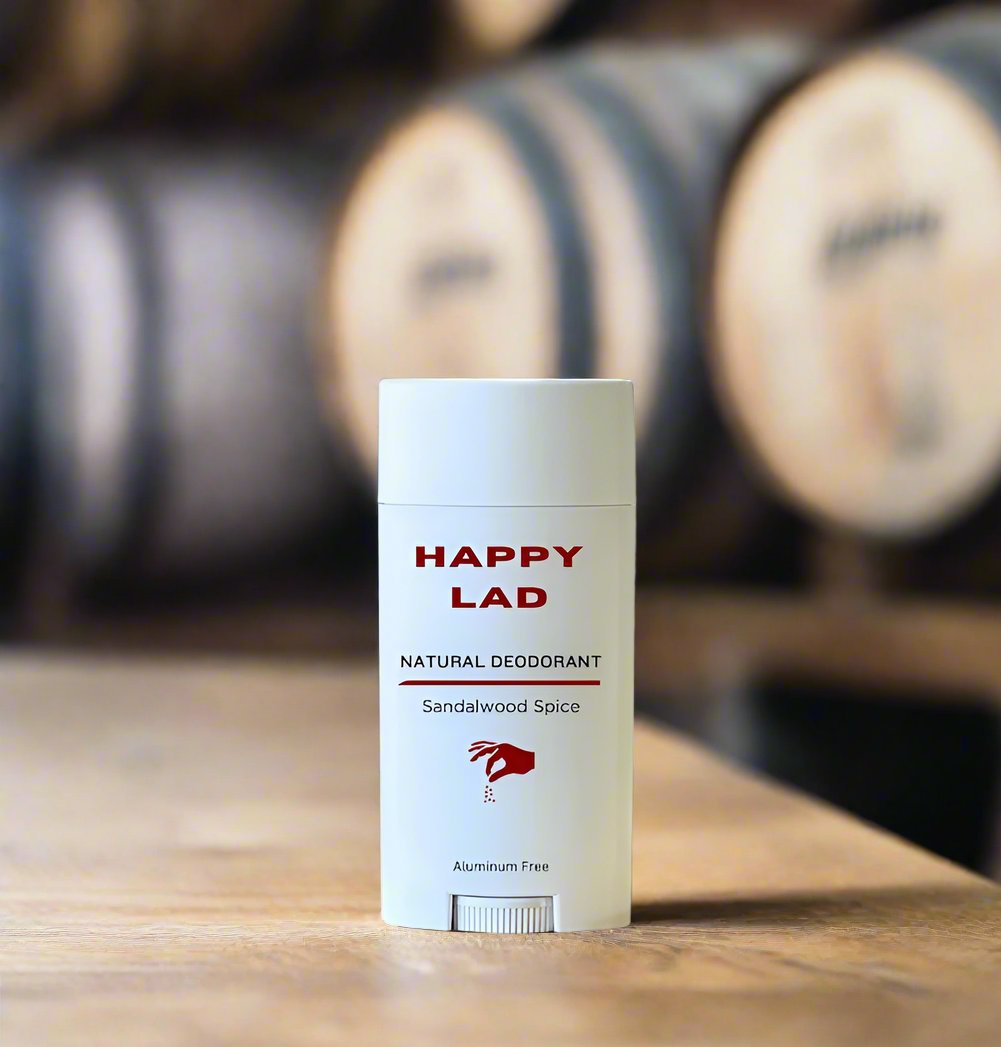 Sandalwood Spice essential oils scented natural deodorant for men from Happy Lad in a bourbon barrel distillery