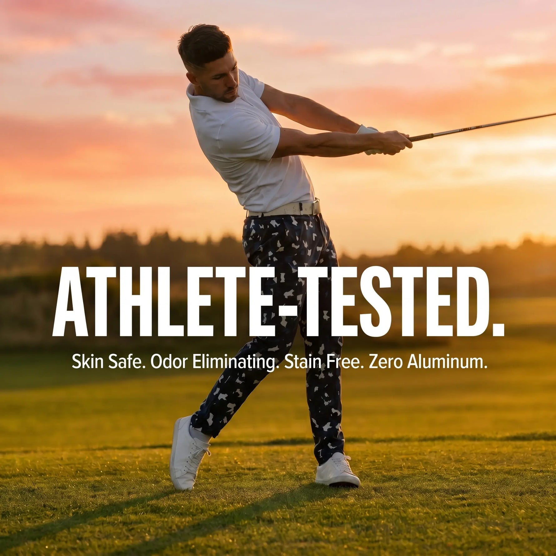 Man playing golf on a grassy field at sunset, with text saying "Athlete-Tested. Sin Safe. Odor Eliminating Stain Free. Aluminum Free."