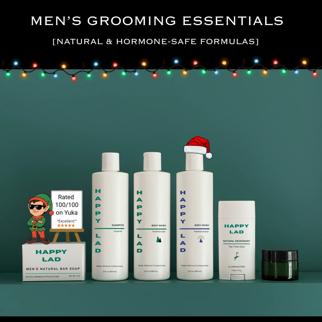 Happy Lad's Natural Grooming Products lined up in a line with Christmas Lights.