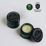 Green face moisturizer with Pterostilibene jar with open lid showing cream, on a white background with.