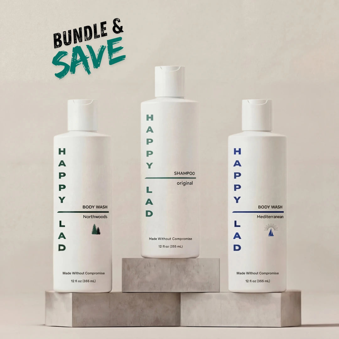 Two bottles of Happy Lad organic body wash and one natural shampoo bottle on a neutral background with 'Bundle & Save' text.
